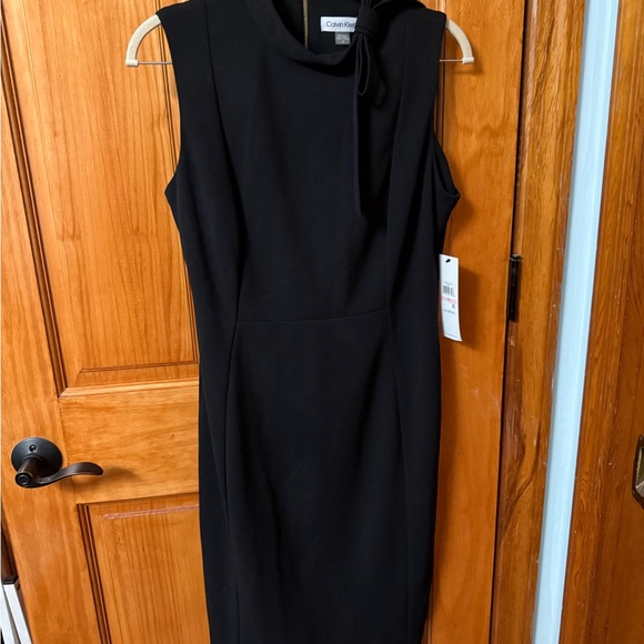 Calvin Klein Dresses & Skirts - NWT Calvin Klein Black Sleeveless Midi Sheath Dress with subtle tie at neck.